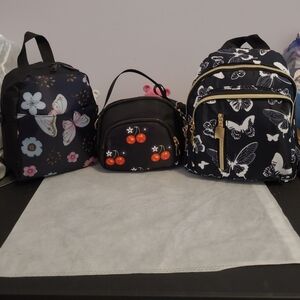 Black and White Butterfly Backpacks and Black Cherry Crossbody